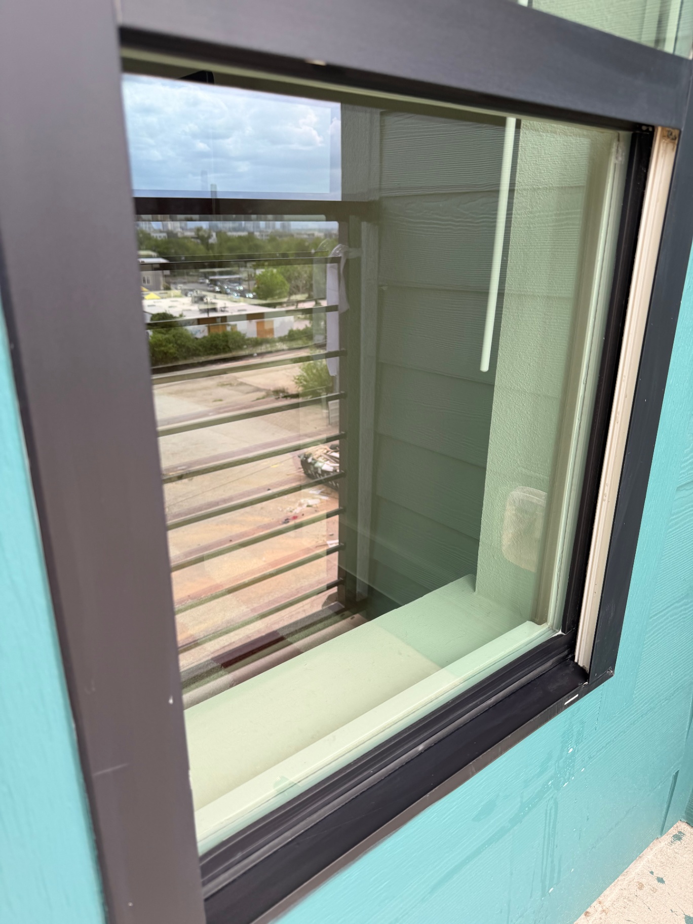 Clean window with downtown Austin skyline view